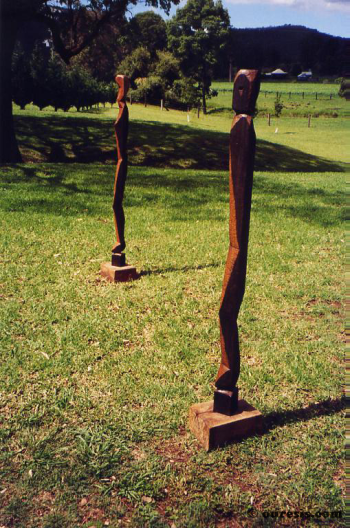 Eve and Adam, hardwood. Photograph from a public group exhibition entitled Sculpture in the Vines, Hunter Valley Harvest Festival, New South Wales, Australia 2003.
